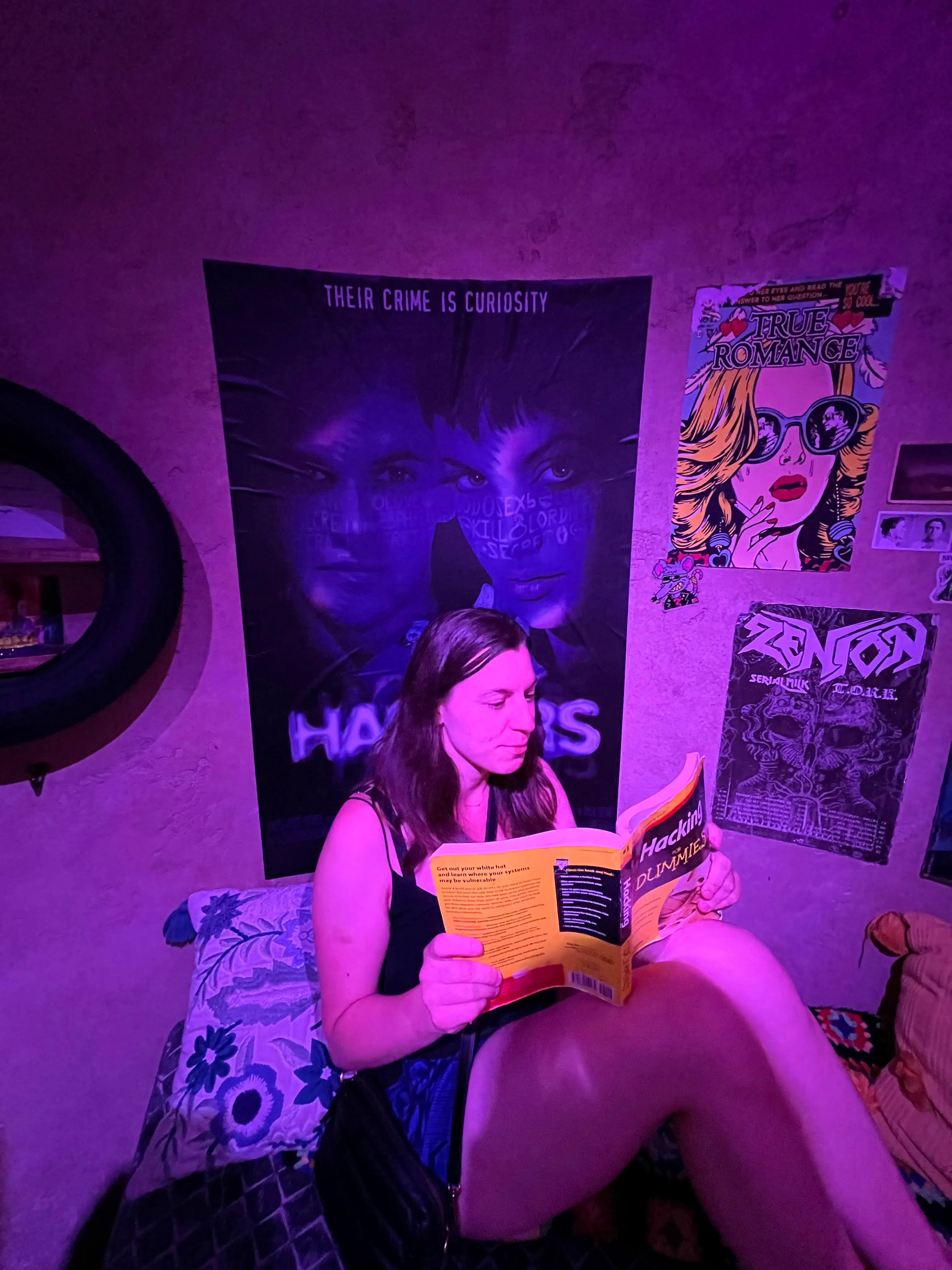 Maya pretending to be a hacker at Meow Wolf