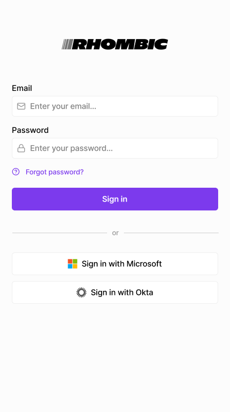Login screen with SSO options to sign in with Microsoft or Okta